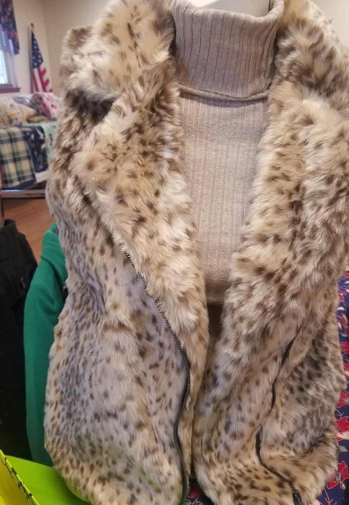 Plush warm faux fur vest.